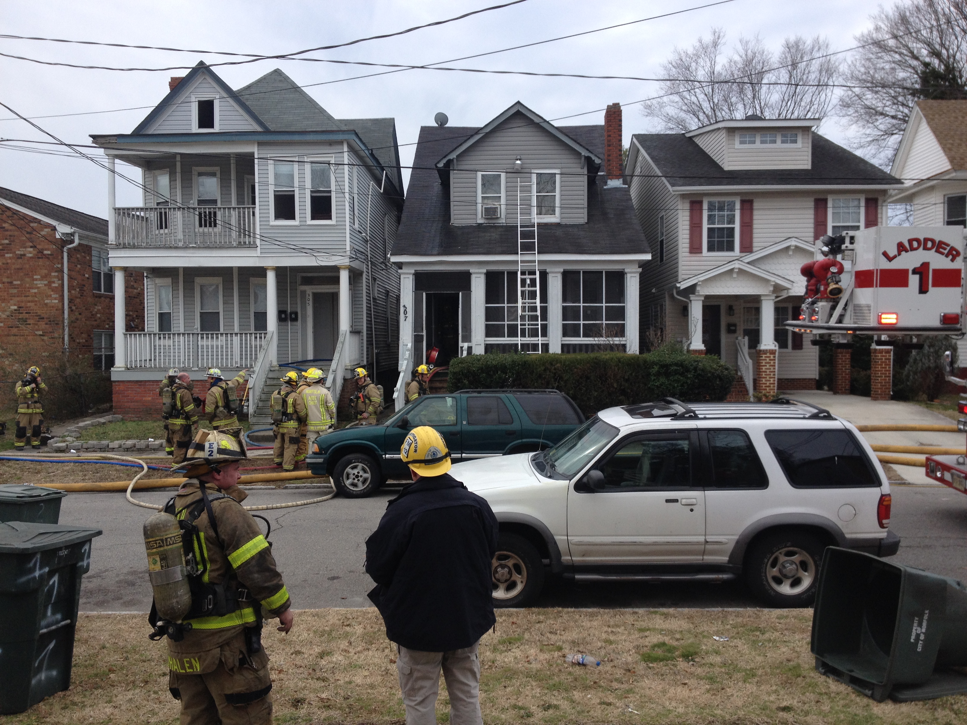Norfolk house fire displaces two residents, damages neighboring home