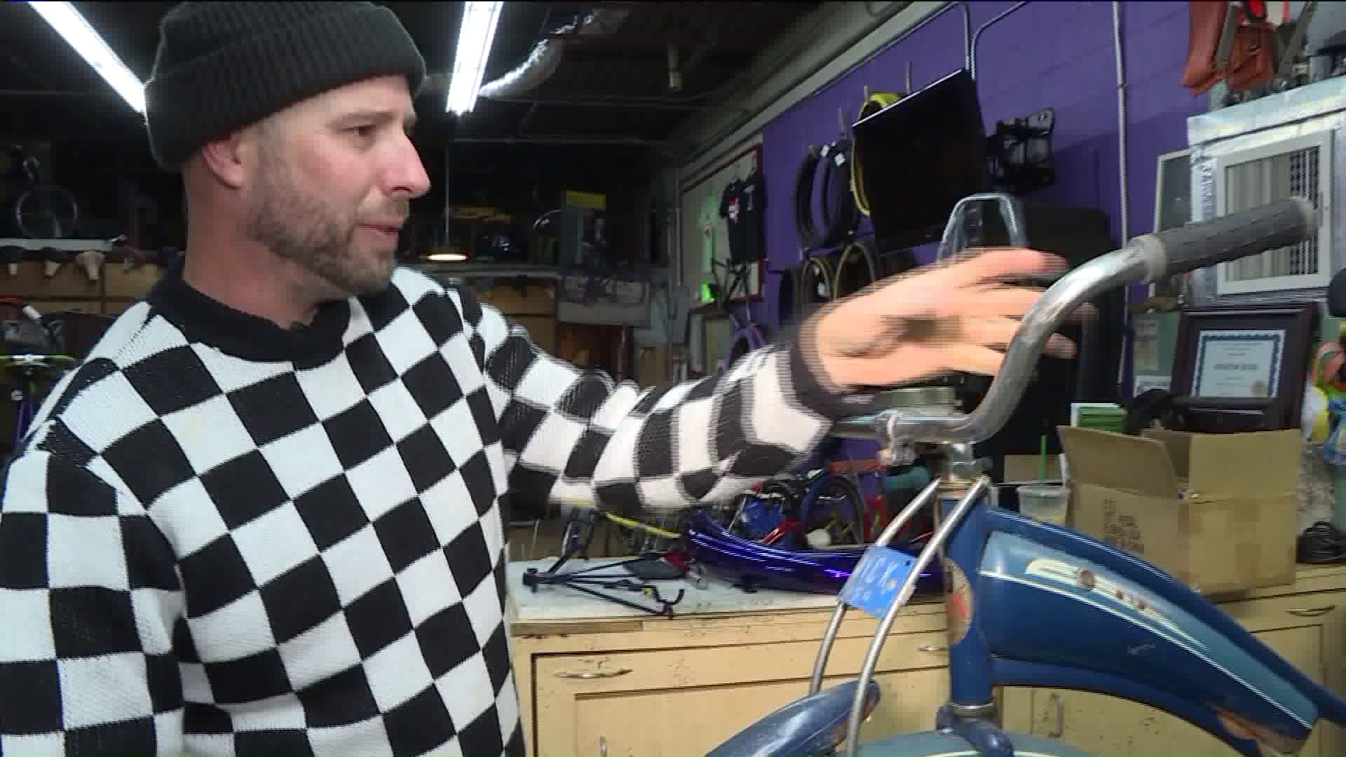 Norfolk shop owner restores bikes, donates to homeless for Christmas